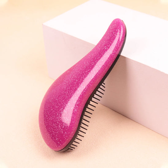 Brosse à cheveux rose