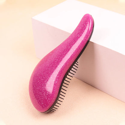 Brosse à cheveux rose