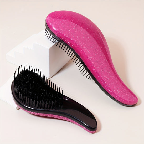 deux brosse a cheveux rose